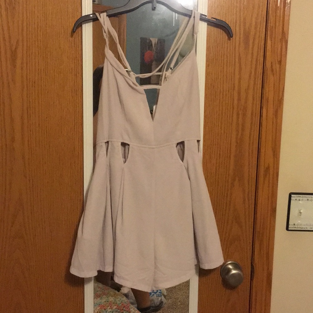 Summer romper with multiple waist cutouts
